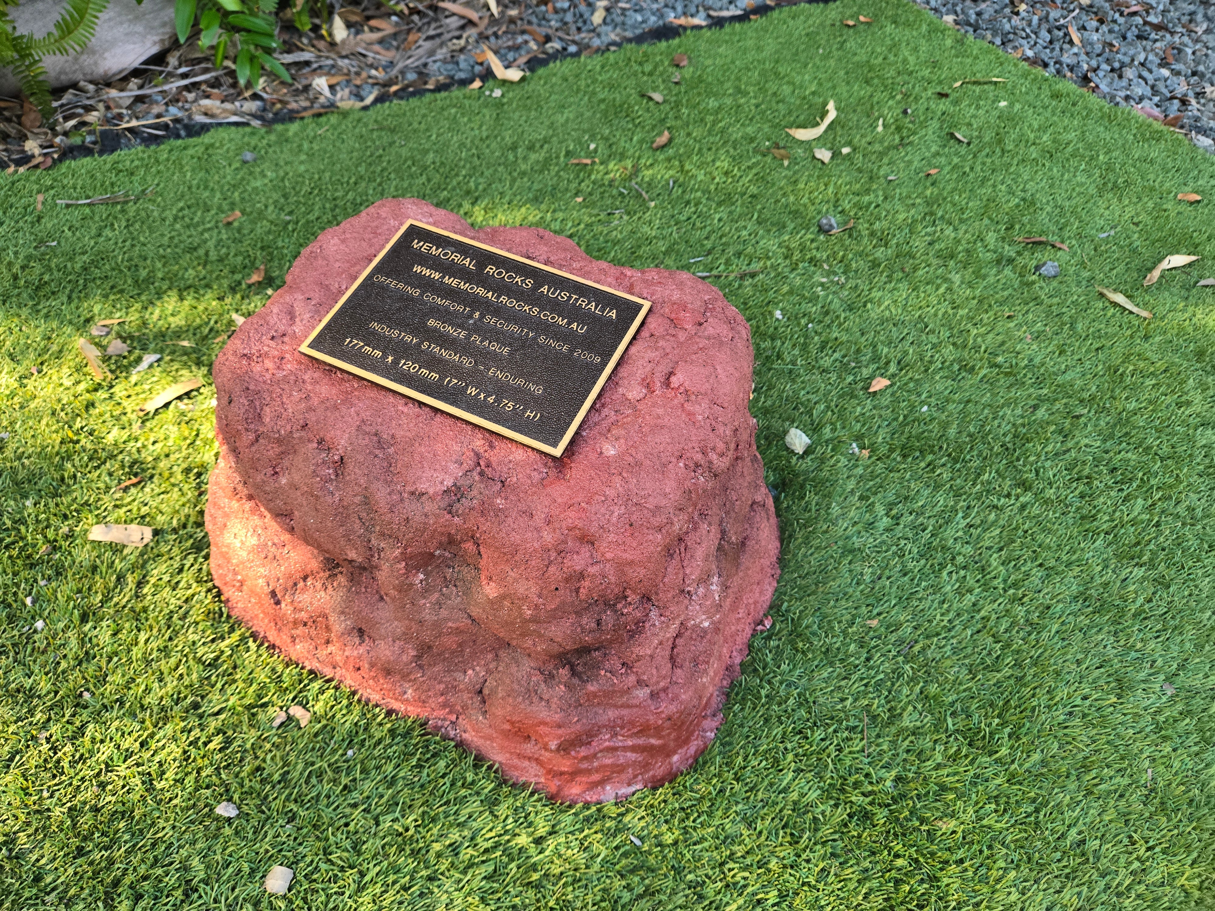 outdoor rock urn and plaque