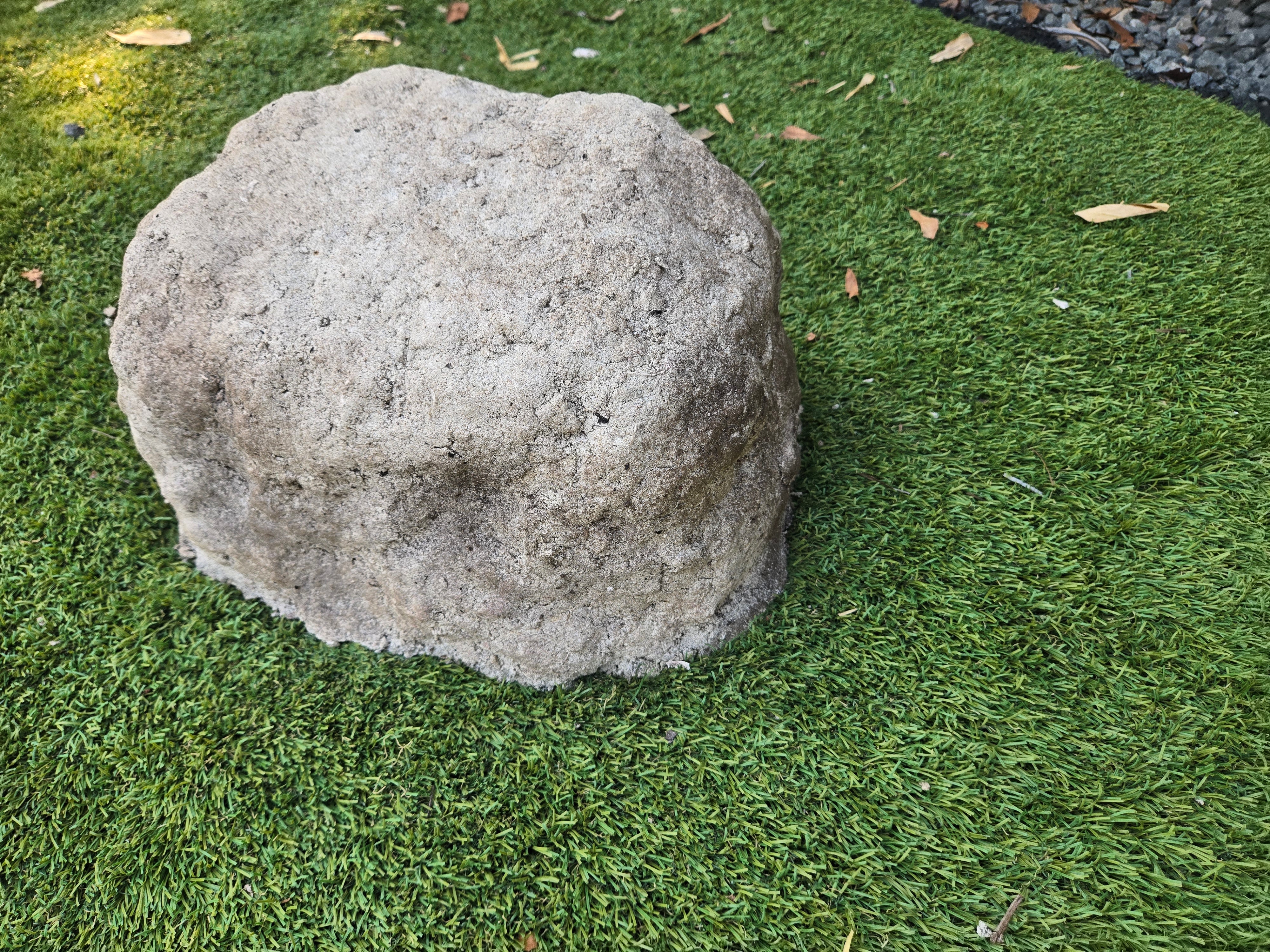 urn for ashes in a shape of a rock