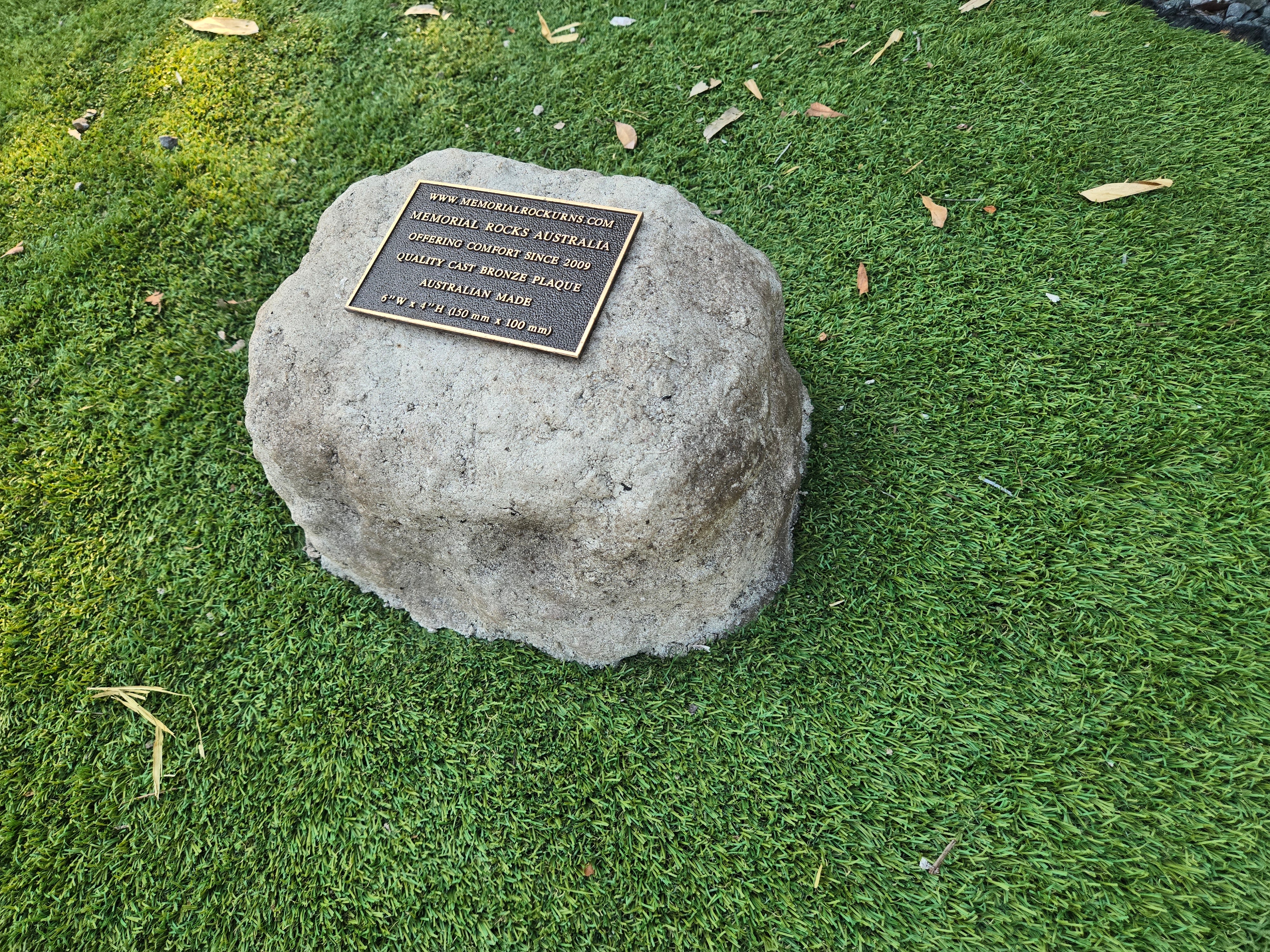 rock urn and plaque